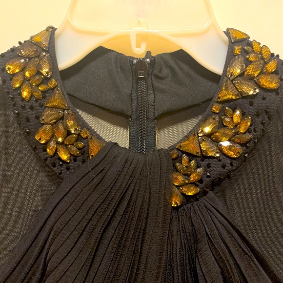 Black gown, long sleeve, stretch sheer sleeves, and rhinestone collar. - Picture 1 of 7